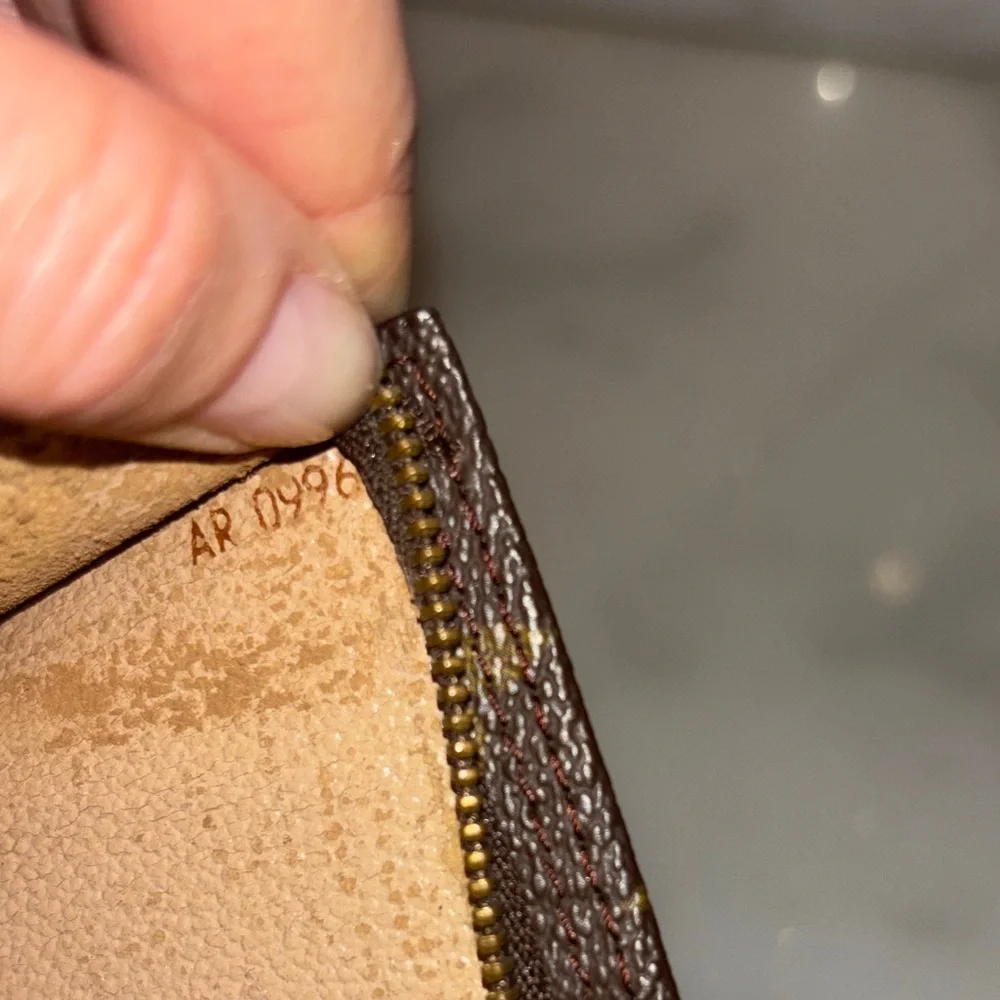 Louis Vuitton Monogram Zip Pouch in Brown and Gold
